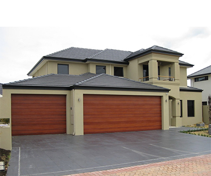 Automatic roll up garage door