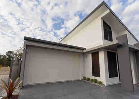 Automatic roll up garage door